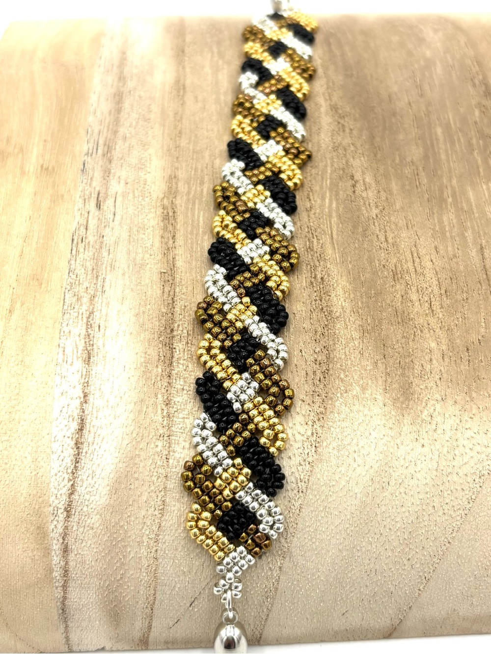 Hand Crafted Celtic Weave Beaded Bracelet in Gold, Silver & Black